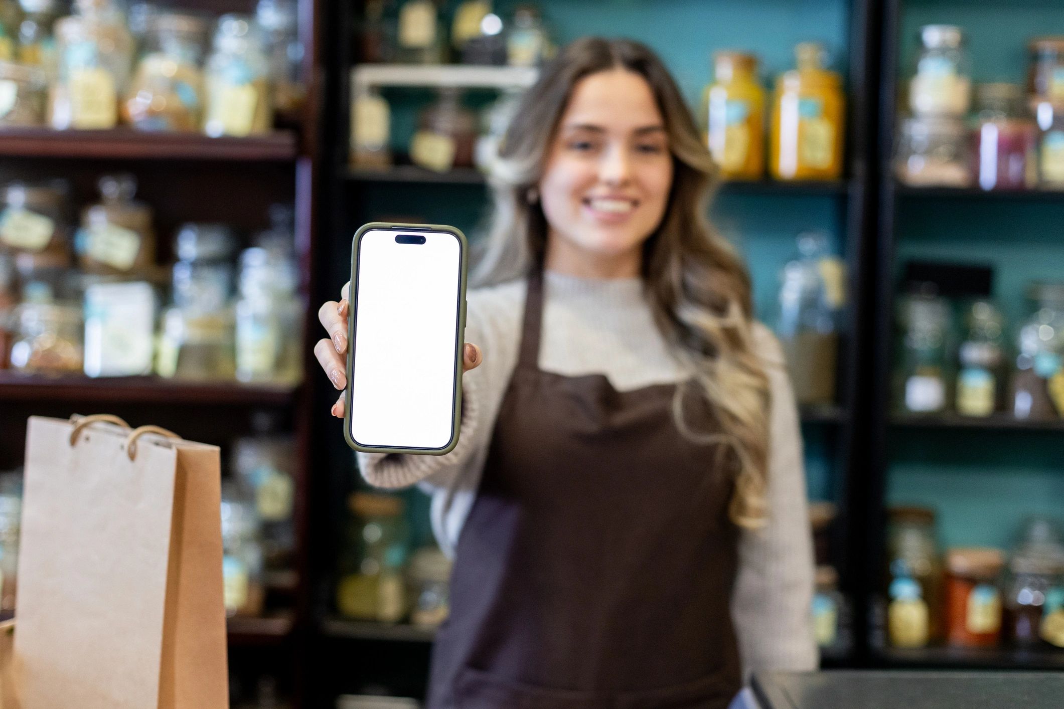 Sales team assisting a customer with phone selection